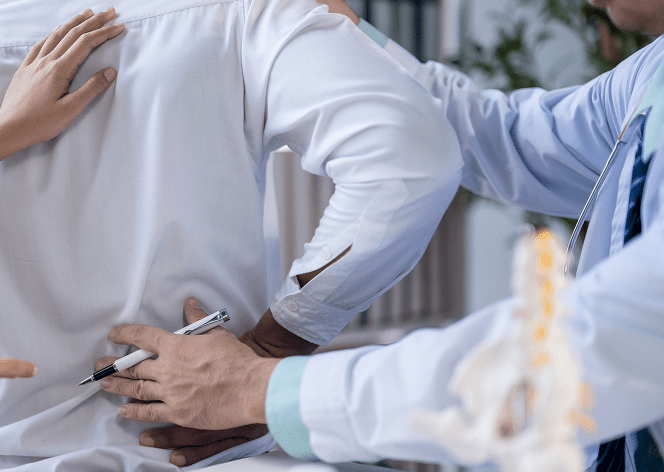 a-man-with-a-back-brace Arthritis Management